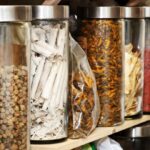 Canisters of different types of herbs