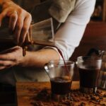 Barista pouring coffee