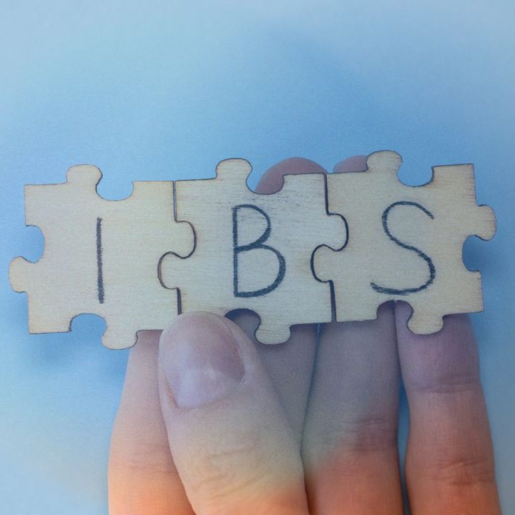 puzzle pieces with the letters I, B, and S written on them