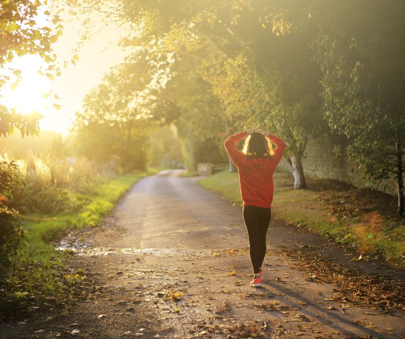 woman walking on path